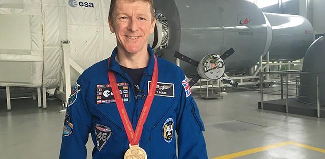 Tim Peake with medal